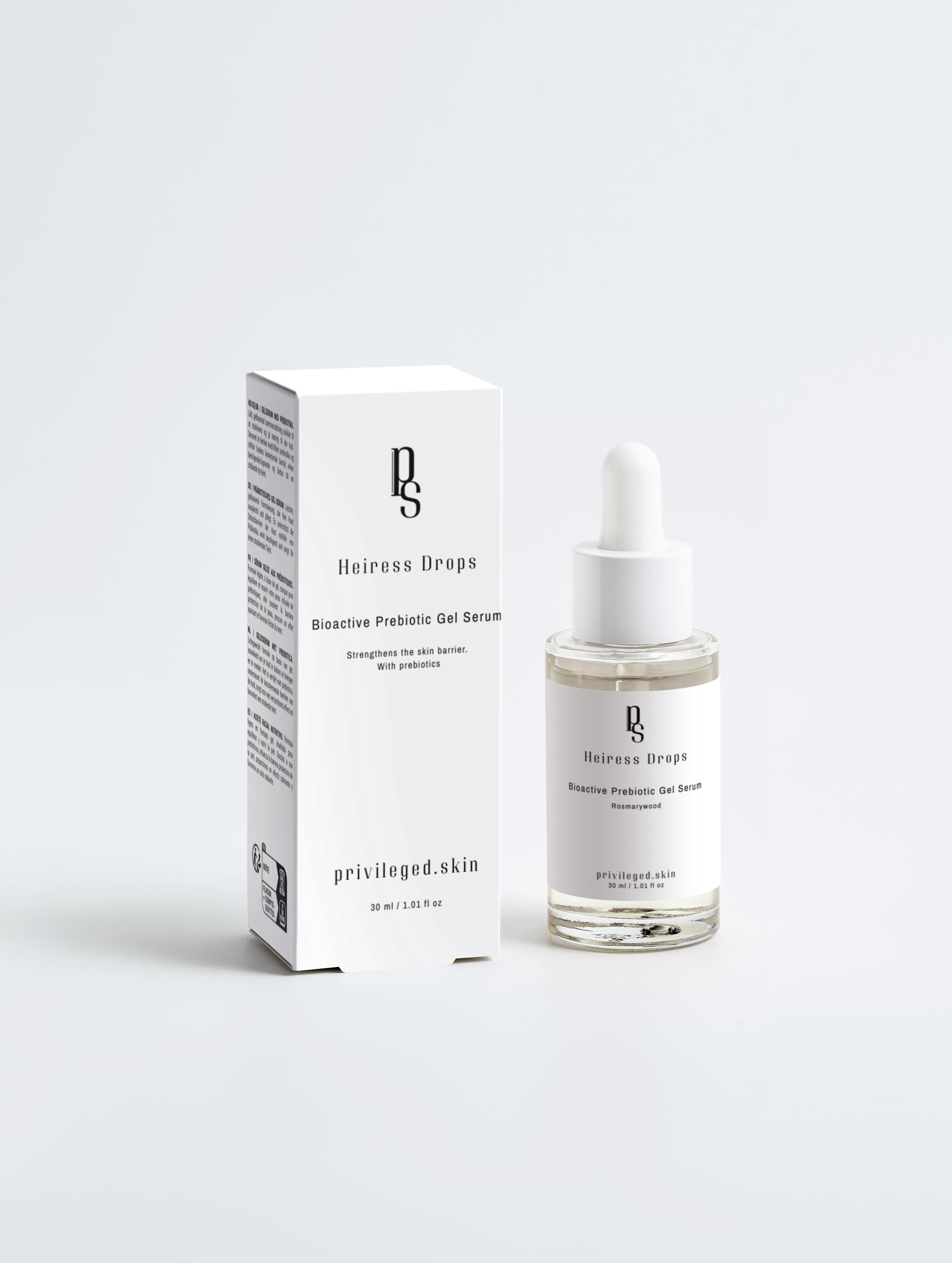 Heiress Drops bioaktives Glow Serum mit Rosmarin-Holz Duft – luxuriöses Präbiotisches Gel für strahlende Haut. Heiress Drops bioactive glow serum with rosemary wood scent. Luxury prebiotic gel for radiant, hydrated skin.